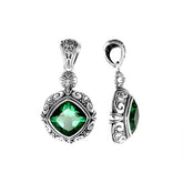 Elegant sterling silver pendant with cushion-cut green quartz, Balinese handcrafted with floral and rope carvings.